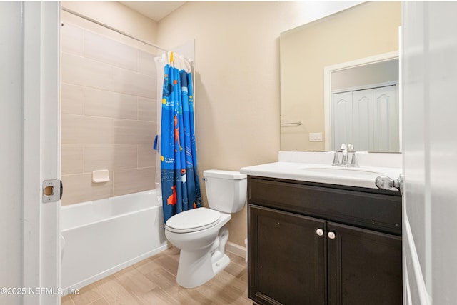 full bathroom with shower / bath combination with curtain, vanity, toilet, and hardwood / wood-style floors