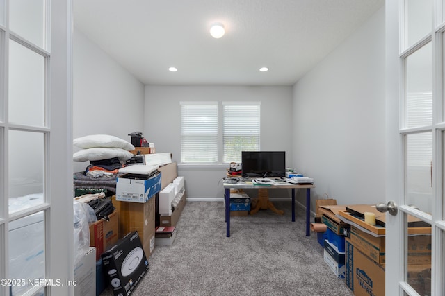 view of carpeted office space