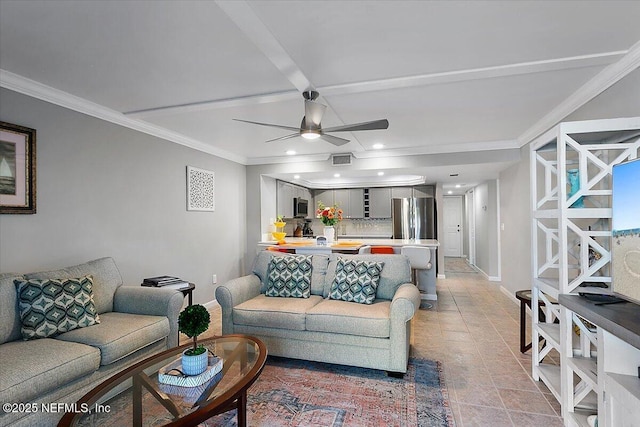 tiled living room featuring ornamental molding and ceiling fan