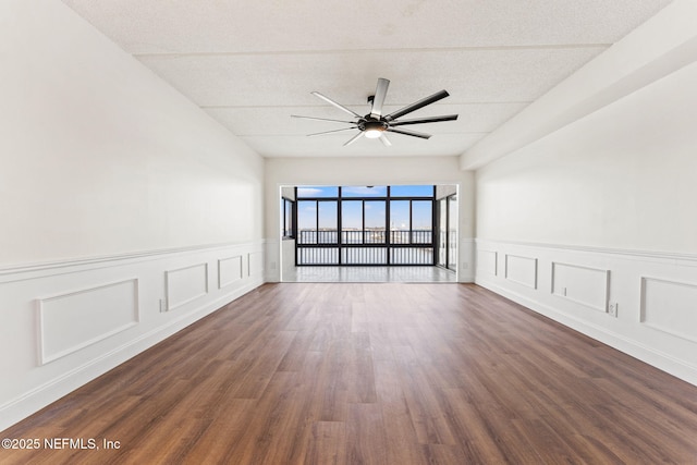 2280 Shepard St Unit 204, Jacksonville, FL 32211 - spare room featuring dark wood-type flooring and ceiling fan