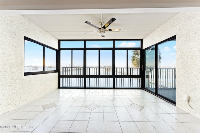 2280 Shepard St Unit 204, Jacksonville, FL 32211 - empty room with light tile patterned flooring and ceiling fan