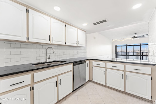 2280 Shepard St Unit 204, Jacksonville, FL 32211 - kitchen featuring sink, white cabinetry, dishwasher, ceiling fan, and backsplash