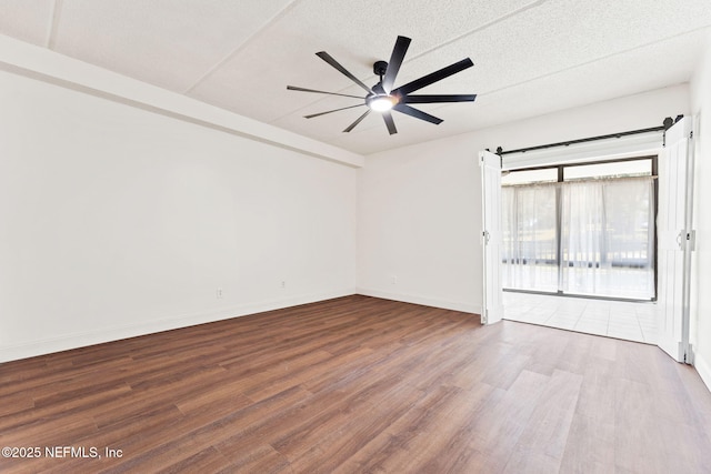 2280 Shepard St Unit 204, Jacksonville, FL 32211 - unfurnished room featuring hardwood / wood-style flooring, a textured ceiling, and ceiling fan