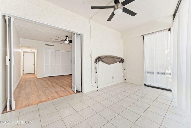 2280 Shepard St Unit 204, Jacksonville, FL 32211 - spare room with ceiling fan and light tile patterned floors