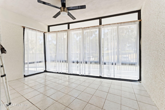 2280 Shepard St Unit 204, Jacksonville, FL 32211 - tiled spare room featuring plenty of natural light and ceiling fan