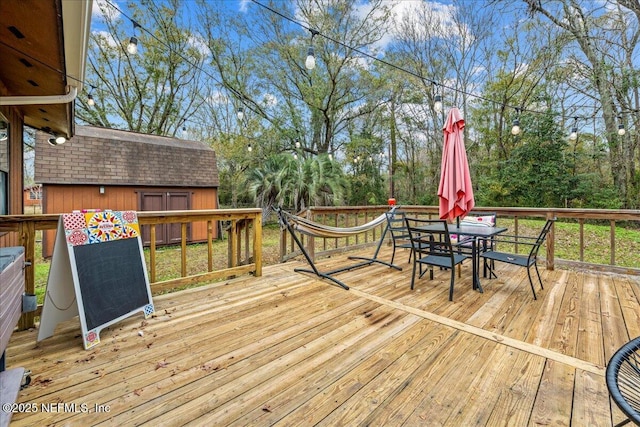 deck featuring a storage unit