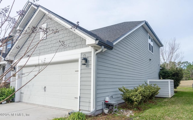 view of property exterior featuring roof with shingles