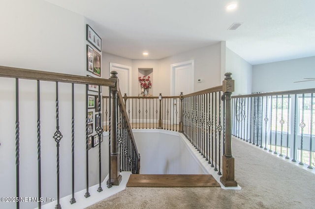 staircase with carpet, visible vents, and recessed lighting