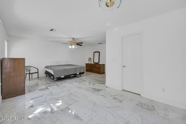 unfurnished bedroom featuring ceiling fan