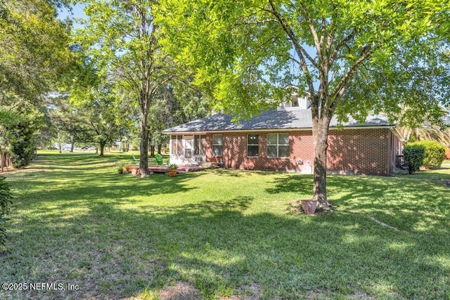 exterior space featuring a front lawn