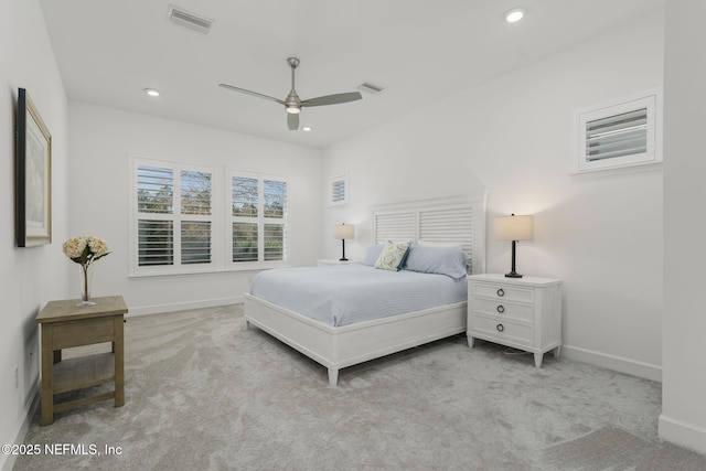 bedroom with light colored carpet and ceiling fan