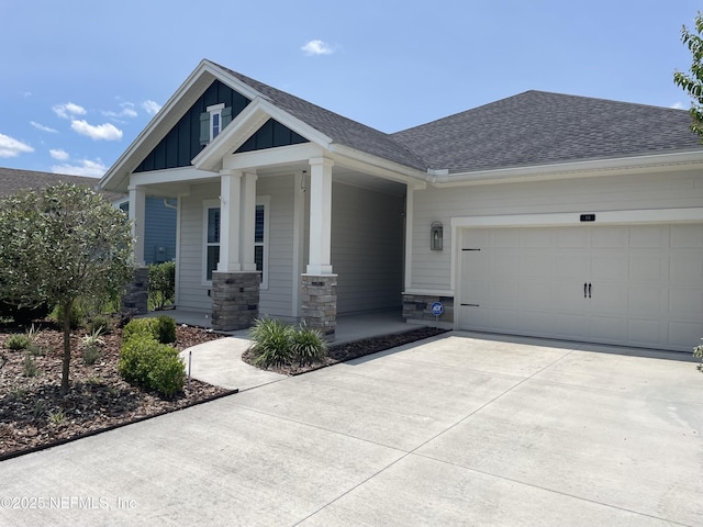 88 Shadow Ridge Trl, Ponte Vedra, FL 32081 - craftsman-style home featuring board and batten siding, concrete driveway, covered porch, a garage, and roof with shingles