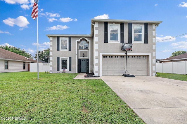 view of front of home featuring a garage and a front lawn