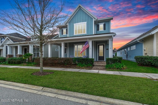 view of front of house with a yard