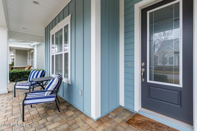 entrance to property with a porch