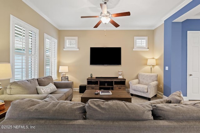 living room with crown molding and ceiling fan