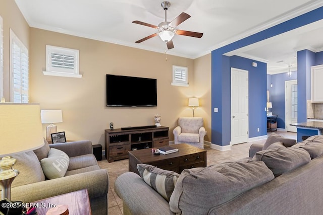 living room featuring crown molding and ceiling fan