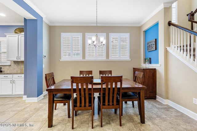 tiled dining area with crown molding and an inviting chandelier