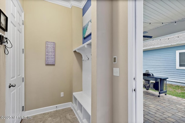 mudroom with crown molding