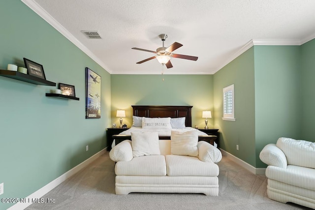 bedroom with crown molding, light colored carpet, and ceiling fan