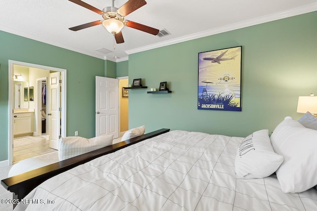 bedroom with crown molding, ceiling fan, and connected bathroom