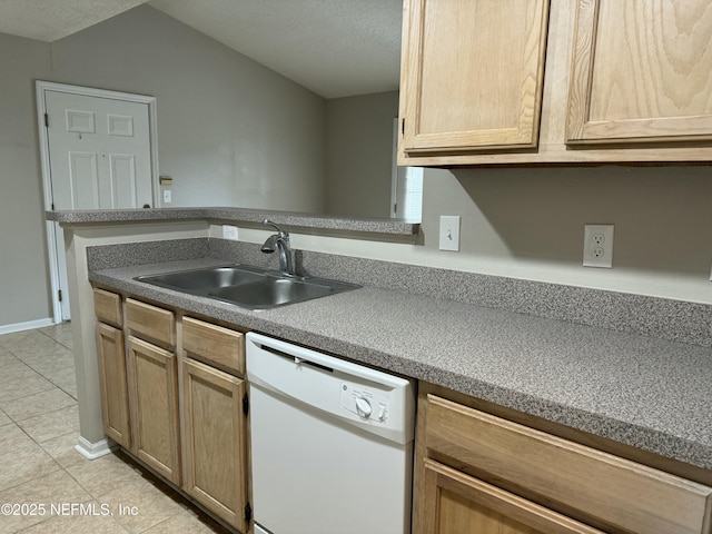 kitchen featuring light tile patterned flooring, sink, a textured ceiling, light brown cabinets, and white dishwasher