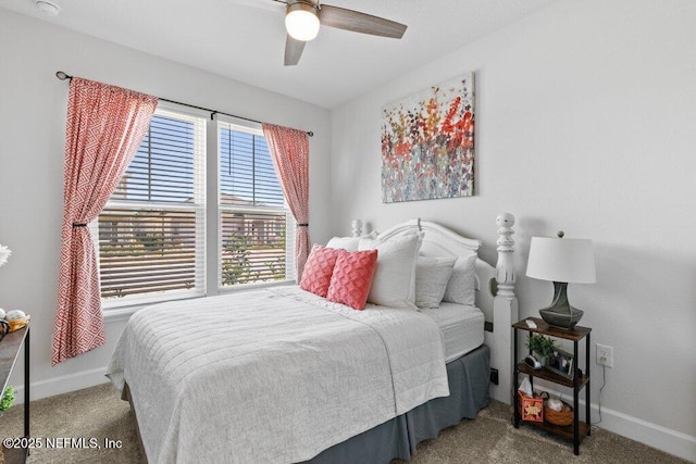 bedroom featuring ceiling fan and carpet