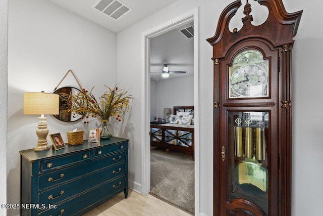 foyer featuring ceiling fan and light wood-type flooring