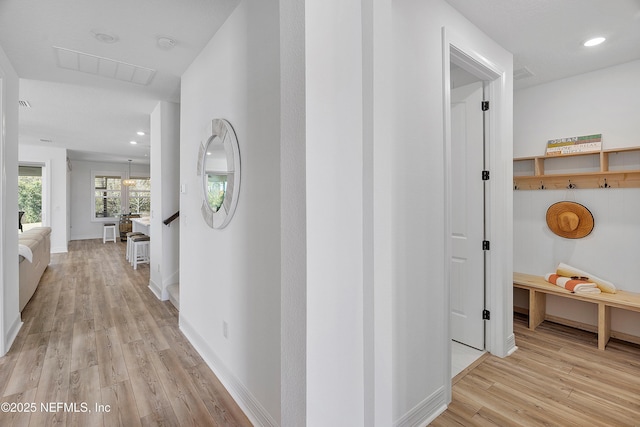 hallway featuring light hardwood / wood-style flooring