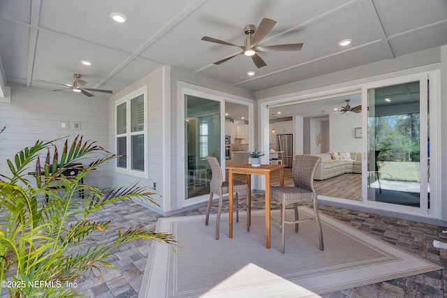 interior space featuring ceiling fan