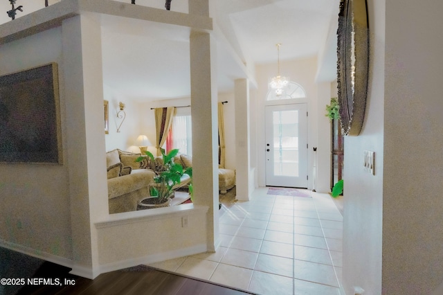 entrance foyer with light tile patterned floors