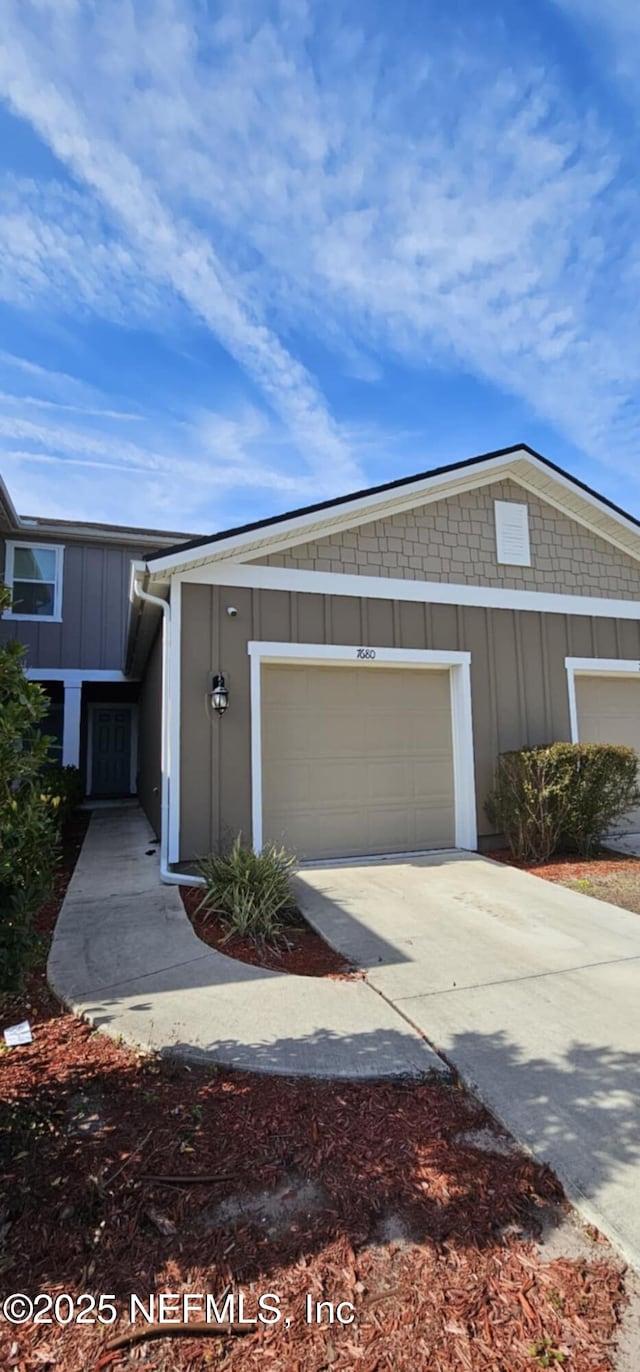 view of property exterior with a garage