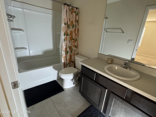 full bathroom featuring vanity, tile patterned floors, toilet, and shower / bath combo with shower curtain