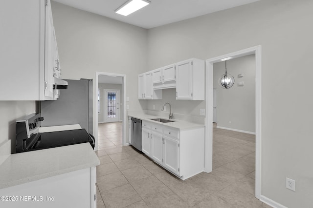 kitchen featuring light tile patterned flooring, sink, appliances with stainless steel finishes, range hood, and white cabinets