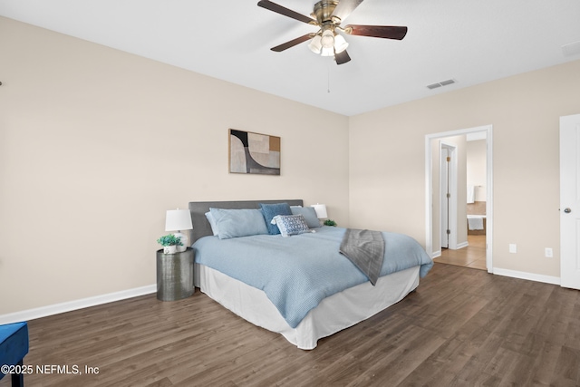 bedroom with dark wood-type flooring and ceiling fan