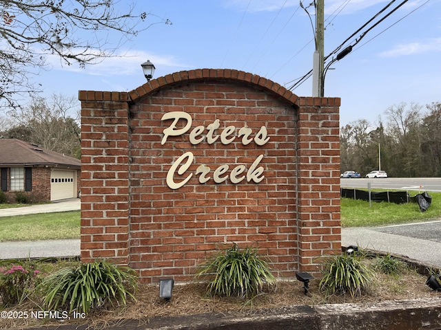 view of community sign