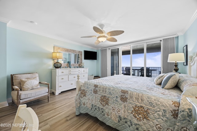 bedroom with access to outside, ornamental molding, ceiling fan, and light wood-type flooring