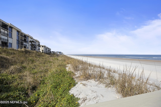 property view of water featuring a beach view