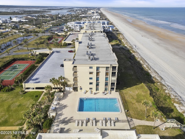 bird's eye view with a water view and a view of the beach