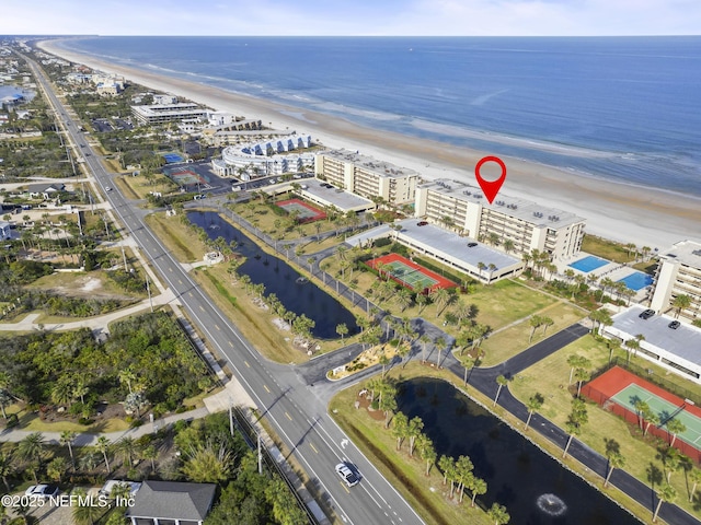 aerial view featuring a water view and a view of the beach