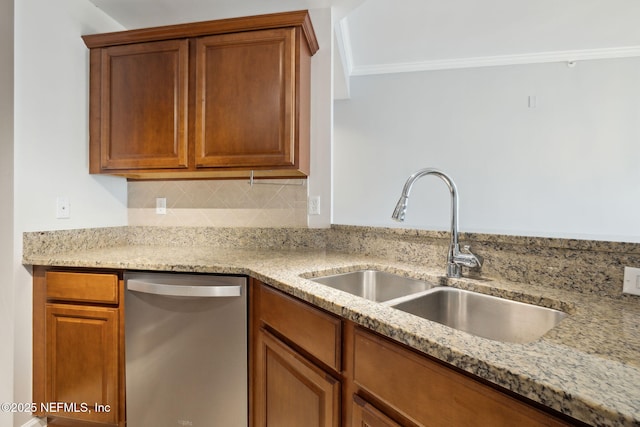 kitchen with sink, dishwasher, ornamental molding, light stone countertops, and decorative backsplash