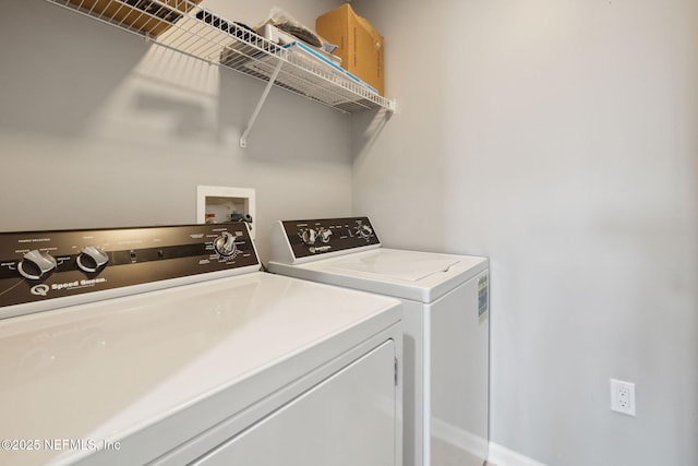 washroom with separate washer and dryer