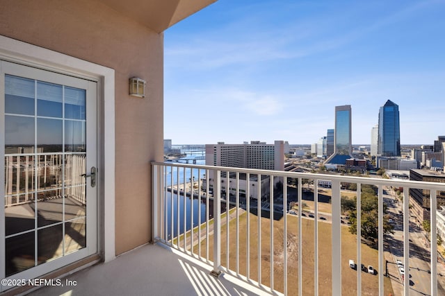 balcony featuring a water view