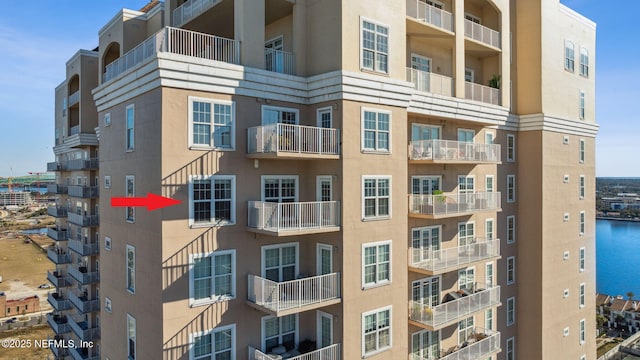 view of property with a water view