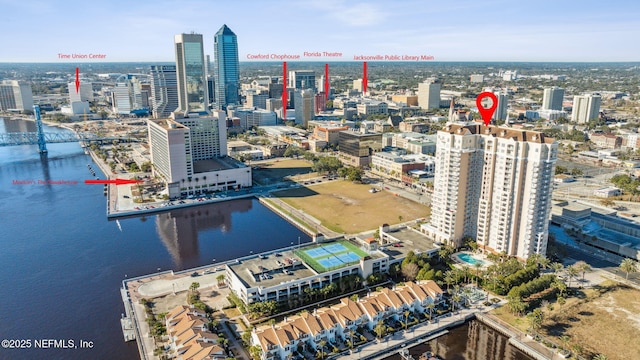 birds eye view of property with a water view