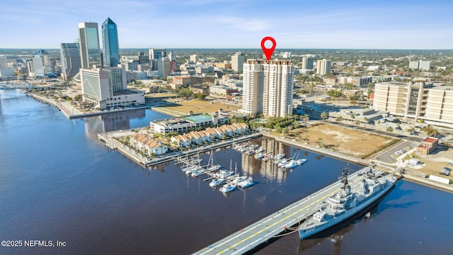 birds eye view of property featuring a water view