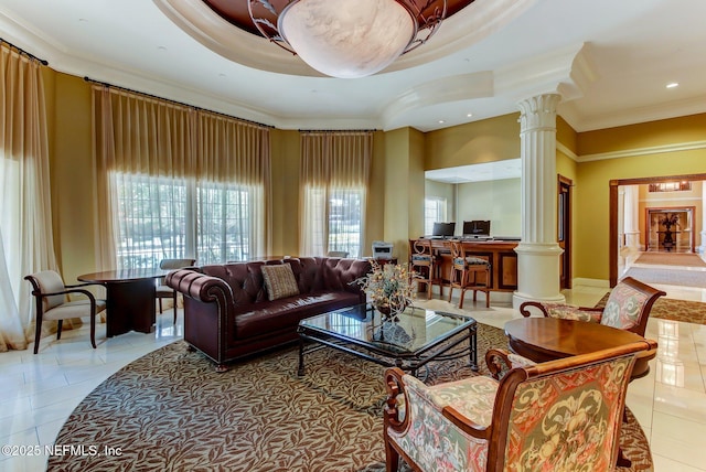 tiled living room with ornate columns and ornamental molding