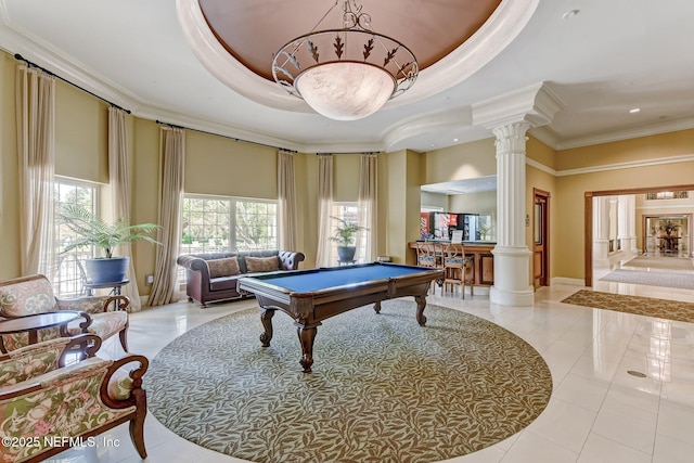 recreation room featuring light tile patterned floors, ornamental molding, and decorative columns