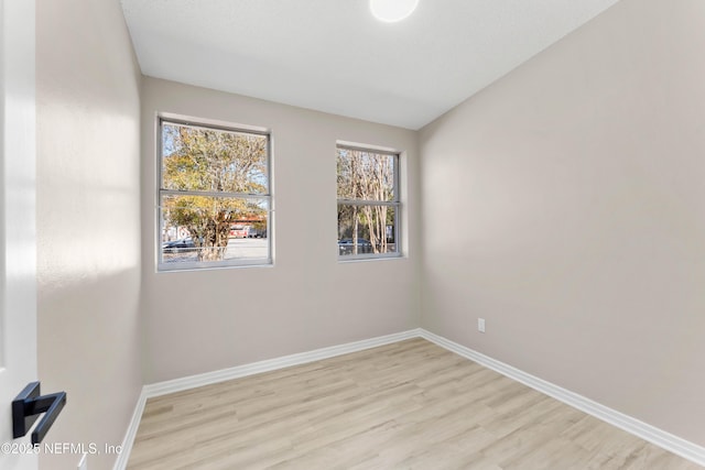 empty room featuring light hardwood / wood-style floors