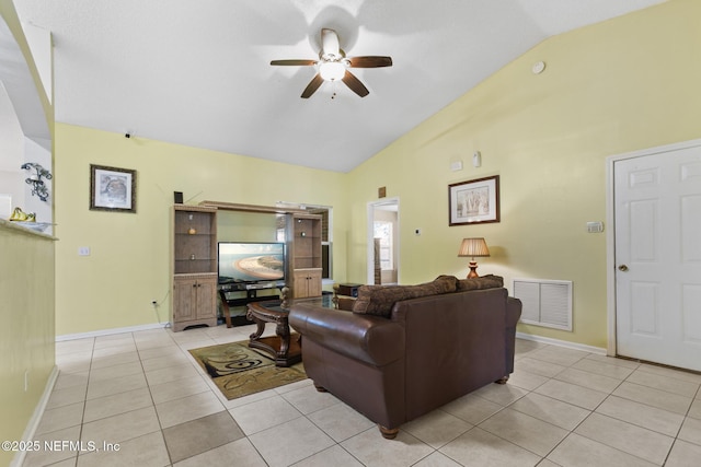 tiled living room with high vaulted ceiling and ceiling fan